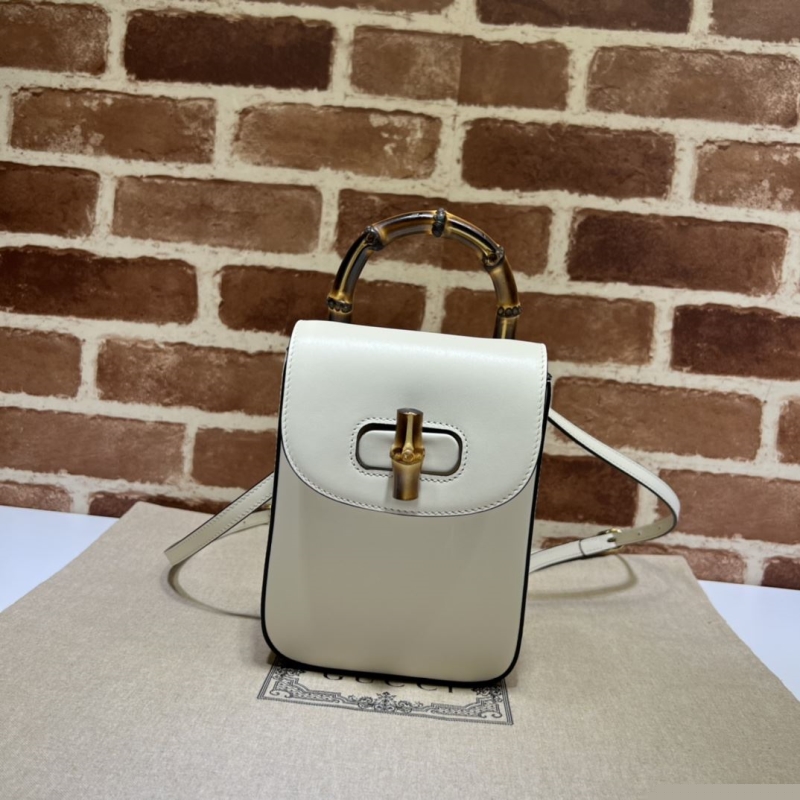 G*u*i top handle bags
